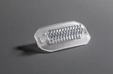 Picture shows transparent plastic components produced by silicone injection moulding