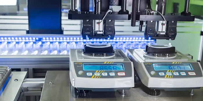 Picture shows production of a plastic component for the automotive industry