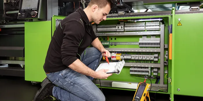 Picture shows inspection and maintenance activities on an ENGEL machine