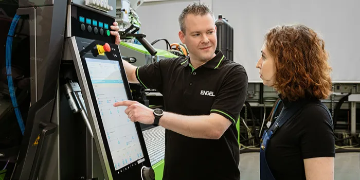 Picture shows annual maintenance of injection molding machine