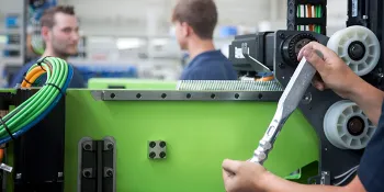 Picture shows assembly of a robot from ENGEL