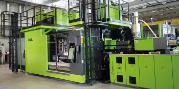 Picture shows ENGEL machine for automotive plastic injection moulding