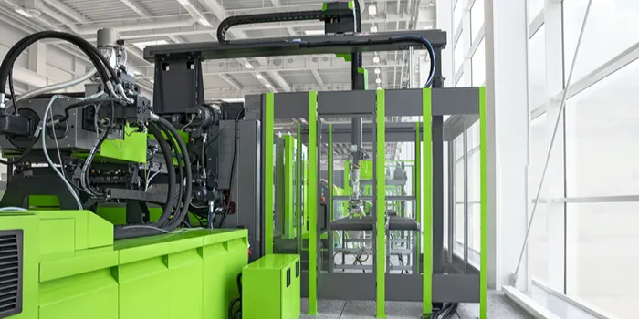 Picture shows injection moulding machine with safety guarding from ENGEL