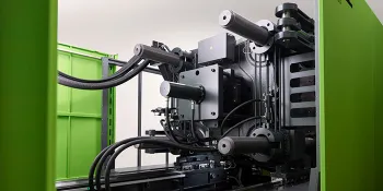 Picture shows clamping unit of a duo injection moulding machine from ENGEL