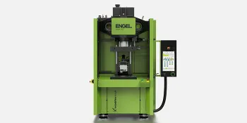 Picture shows vertical injection moulding machine from ENGEL