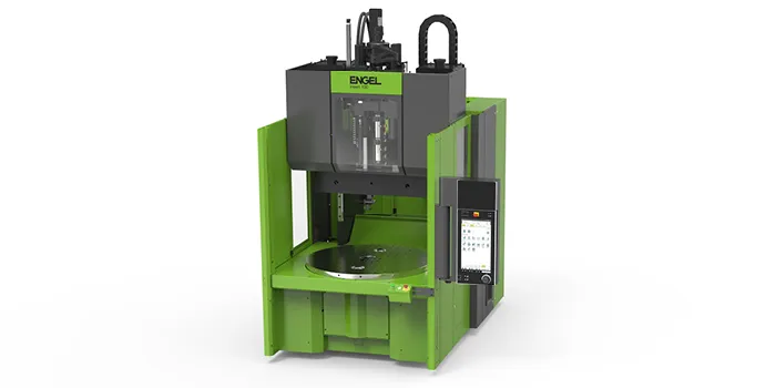 Picture shows injection moulding machine for overmoulding inserts