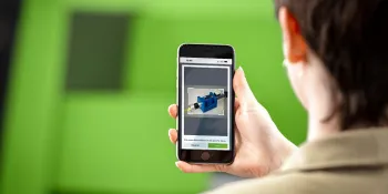 Picture shows smartphone with application of ENGEL's optical spare part identification part finder
