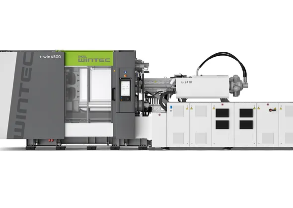 Hydraulic WINTEC t-win 10500 injection molding machine