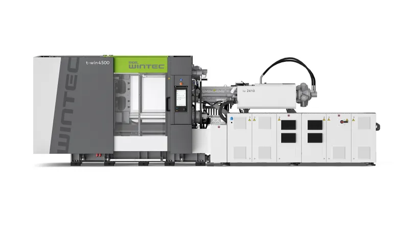 Hydraulic WINTEC t-win 10500 injection molding machine