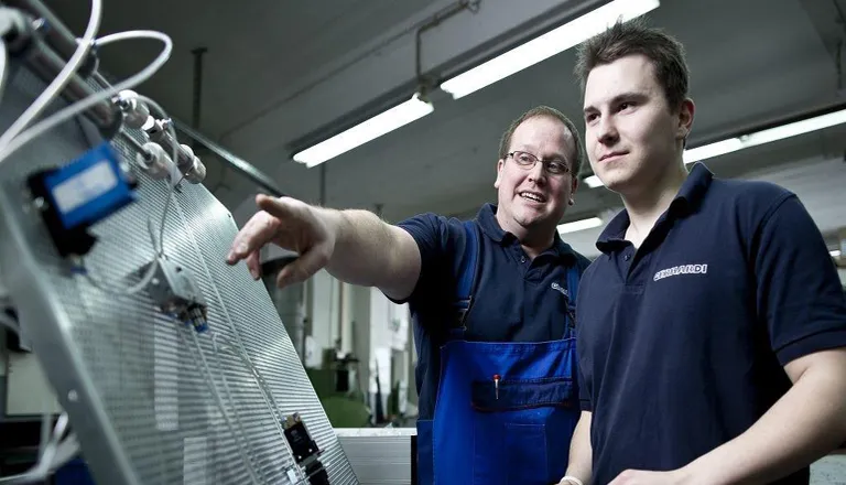 На фото показаны сотрудники Gerhardi