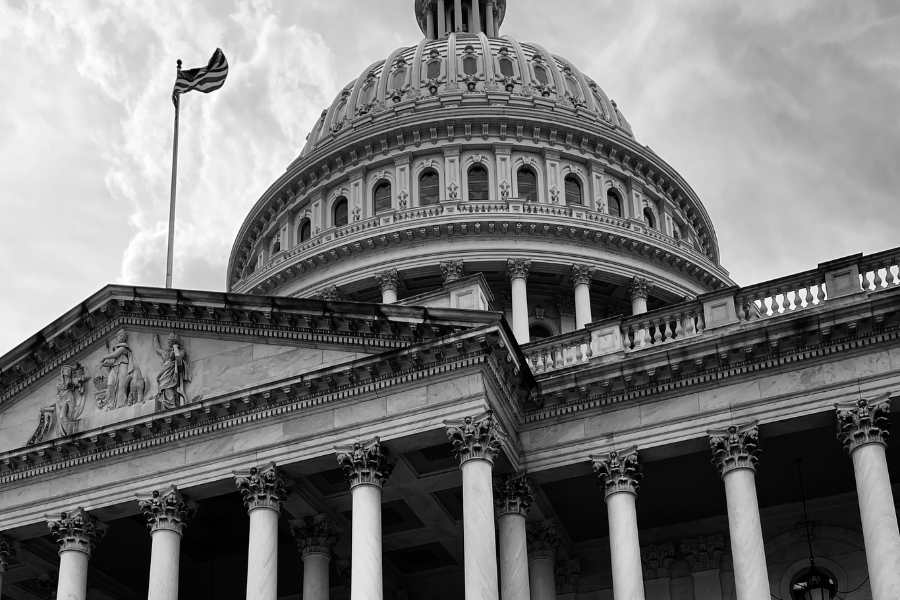 Close-up black and white photo of the U.S. Capitol building in Washington, DC