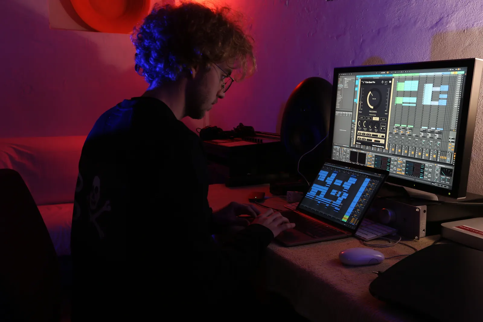 Music producer working on music making software DAW for producing EDM