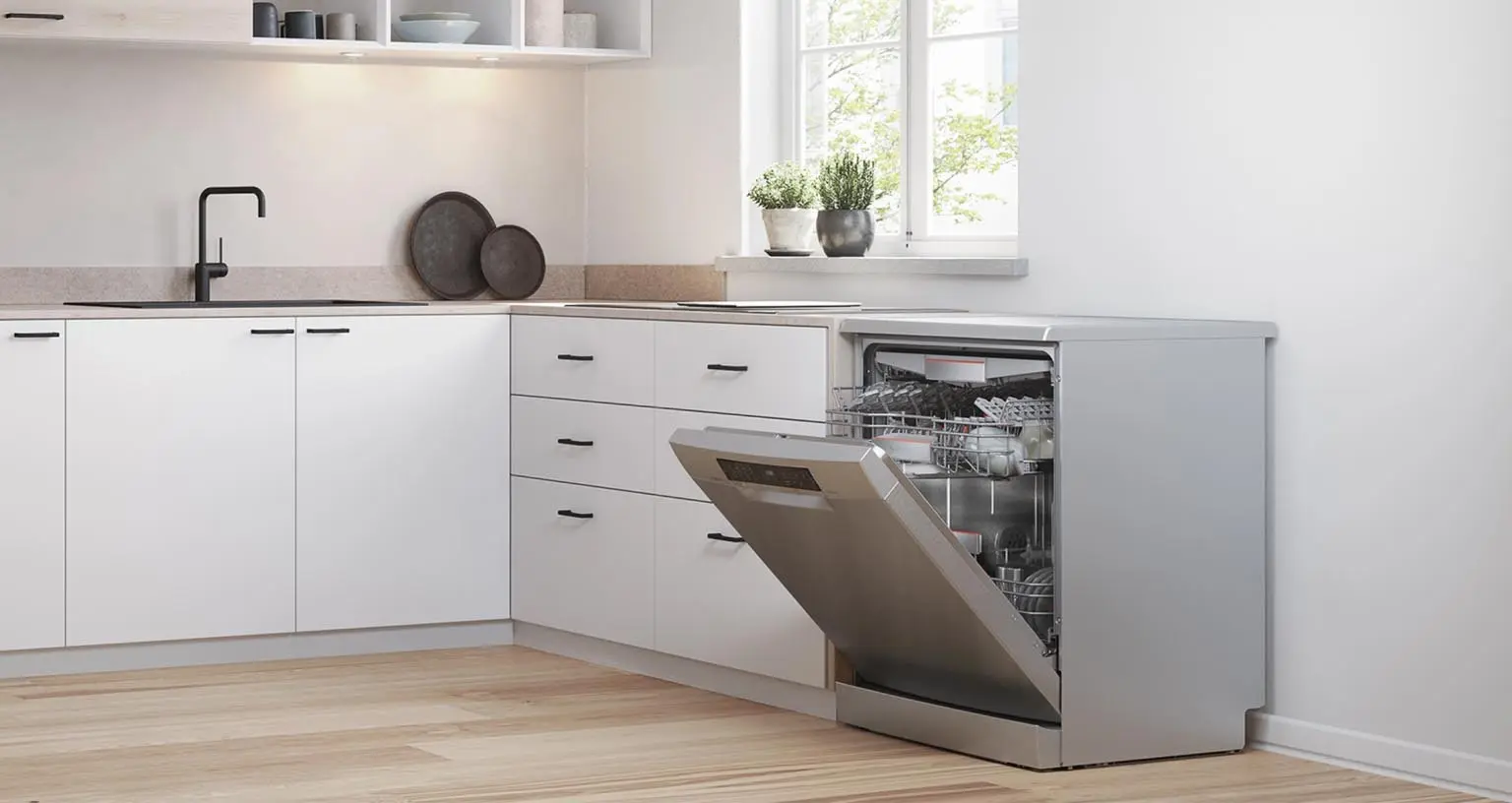 Freestanding Bosch stainless steel dishwasher with open door in a light, white kitchen with black accents.