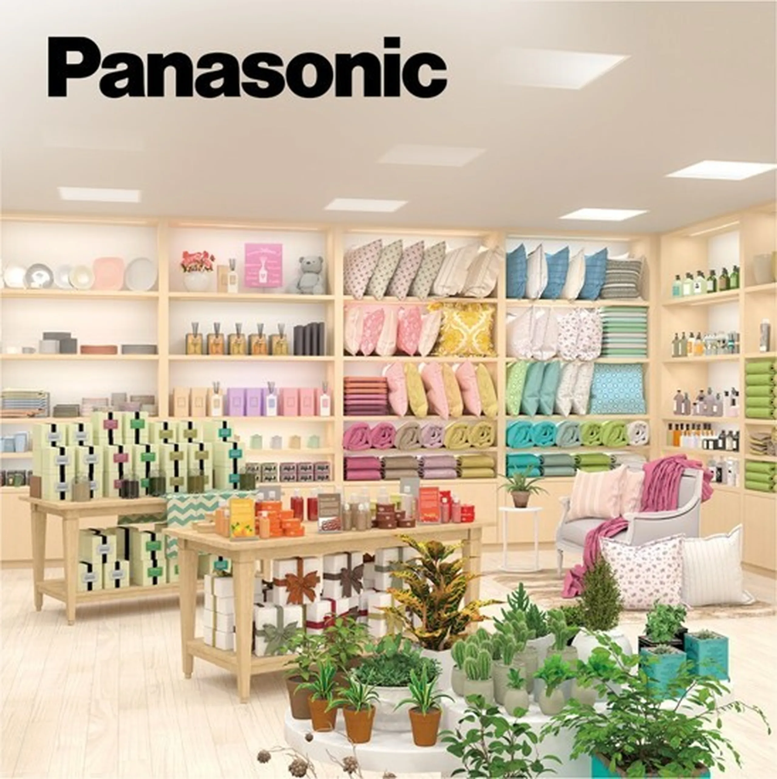 Store interior with Panasonic logo, featuring neatly arranged shelves of colorful pillows, towels, toiletries, and potted plants.