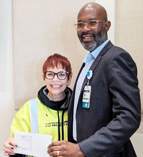 U.S. Borax Community Engagement Manager MB Garrison with Edward Martin, site administrator for Adventist Health Tehachapi Valley.