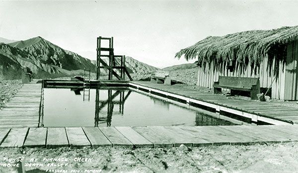 Black and white photo of the swimming pool at the Furnace Creek Ranch