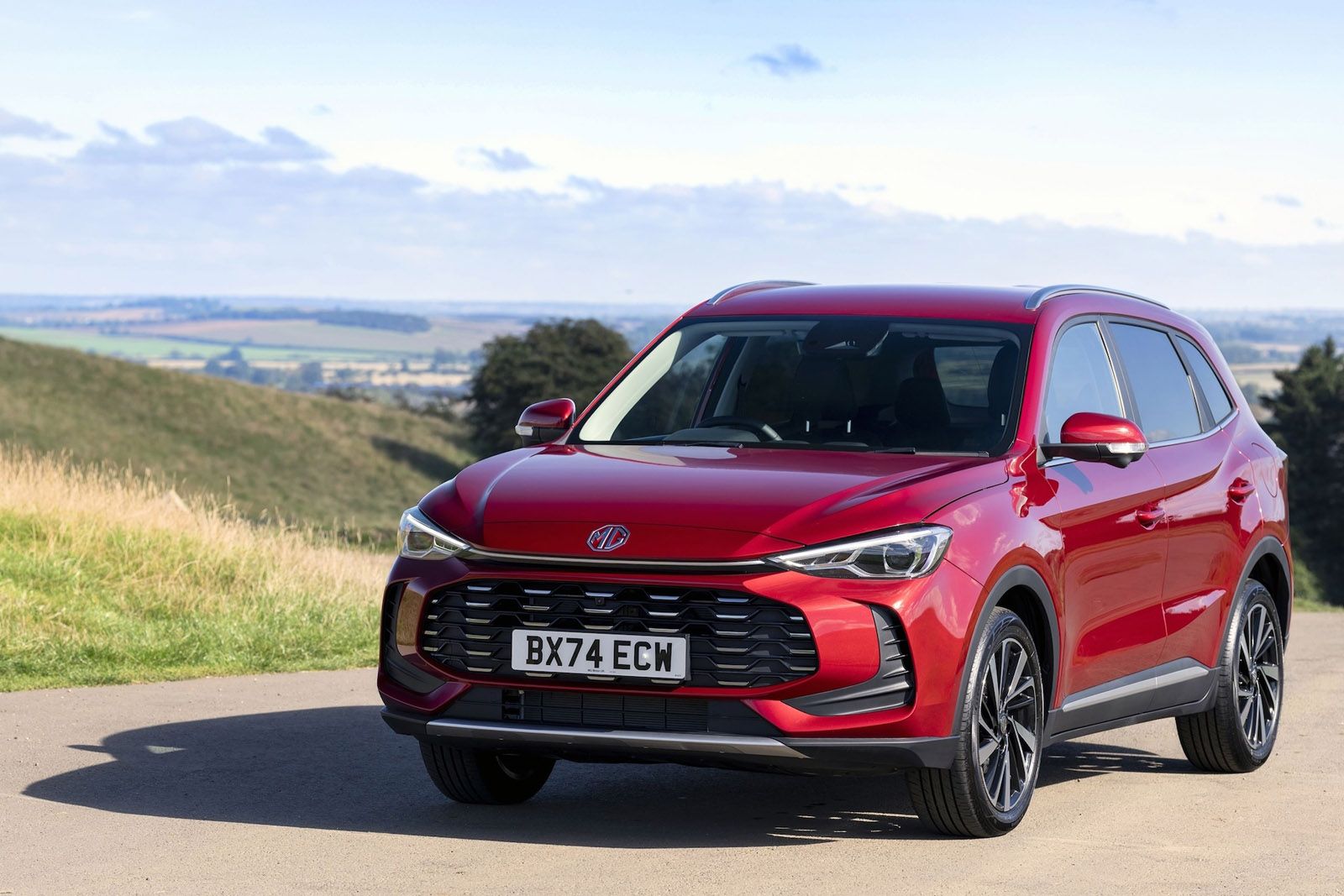 Red MG ZS Hybrid Plus driving