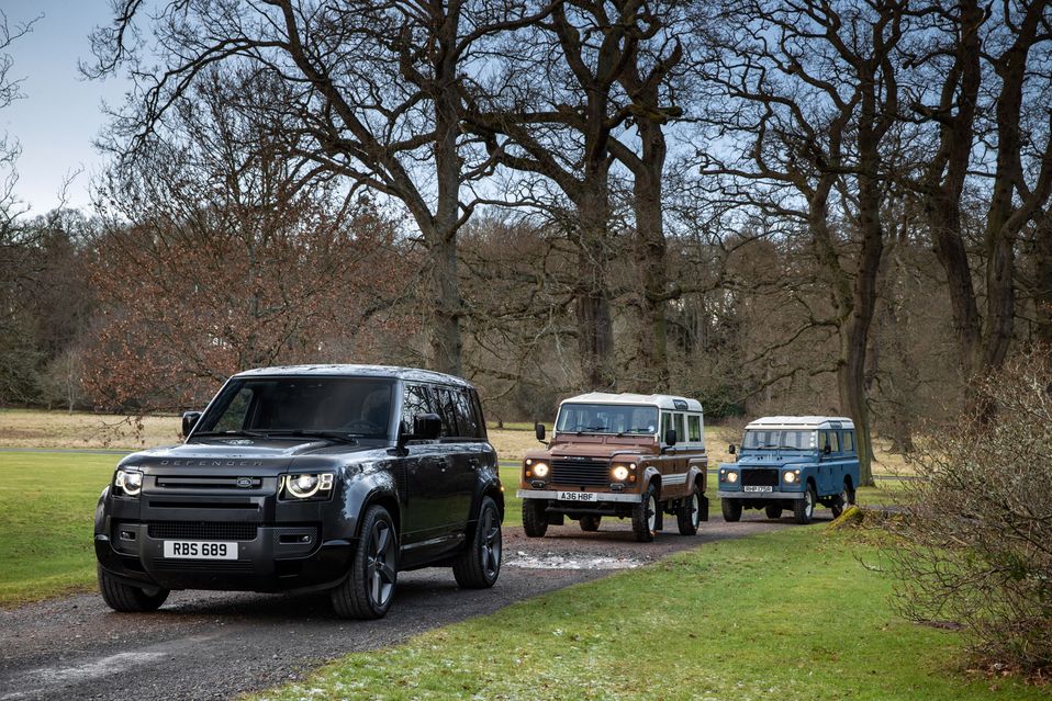 Three Land Rover Defenders green laning
