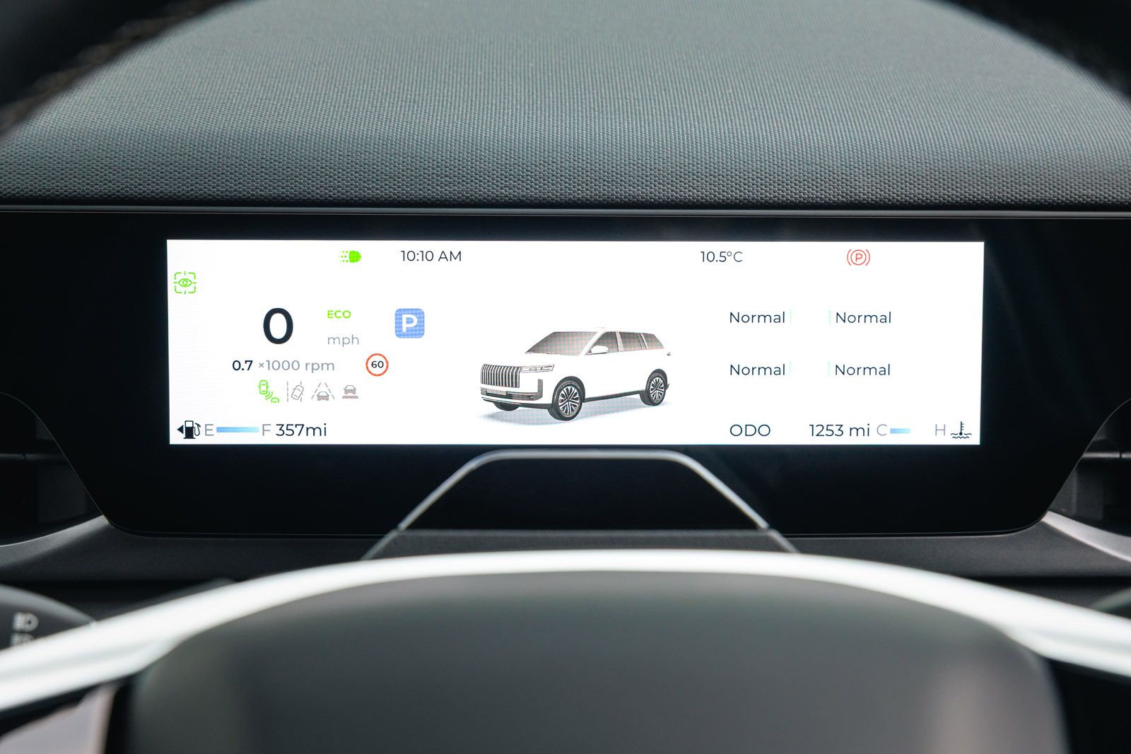 JAECOO 5 dashboard display showing 0 mph, eco mode, parking indicator, temperature 10.5°C, fuel range 357 miles, and odometer 1253 miles.