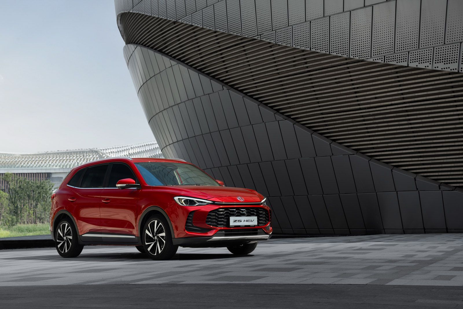 a red MG ZS Hybrid +