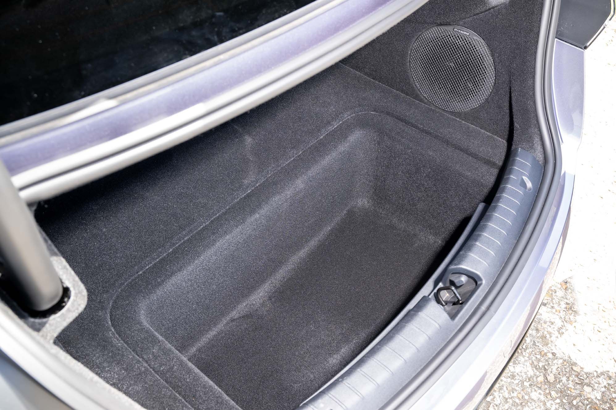 BYD SEAL boot showing a spacious, empty cargo area with dark lining and a speaker on the side.