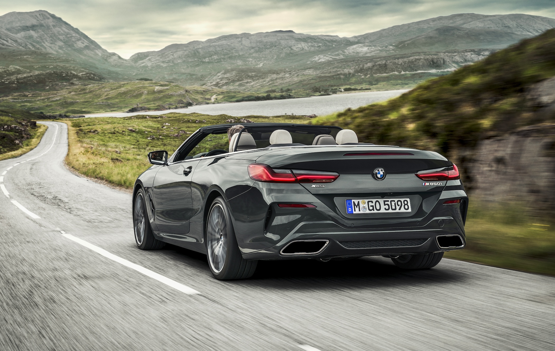 BMW 8 Series M850i Convertible driving away