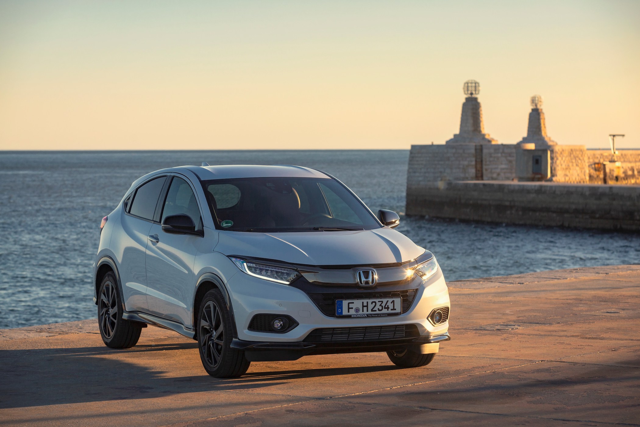 white honda hr-v on pier