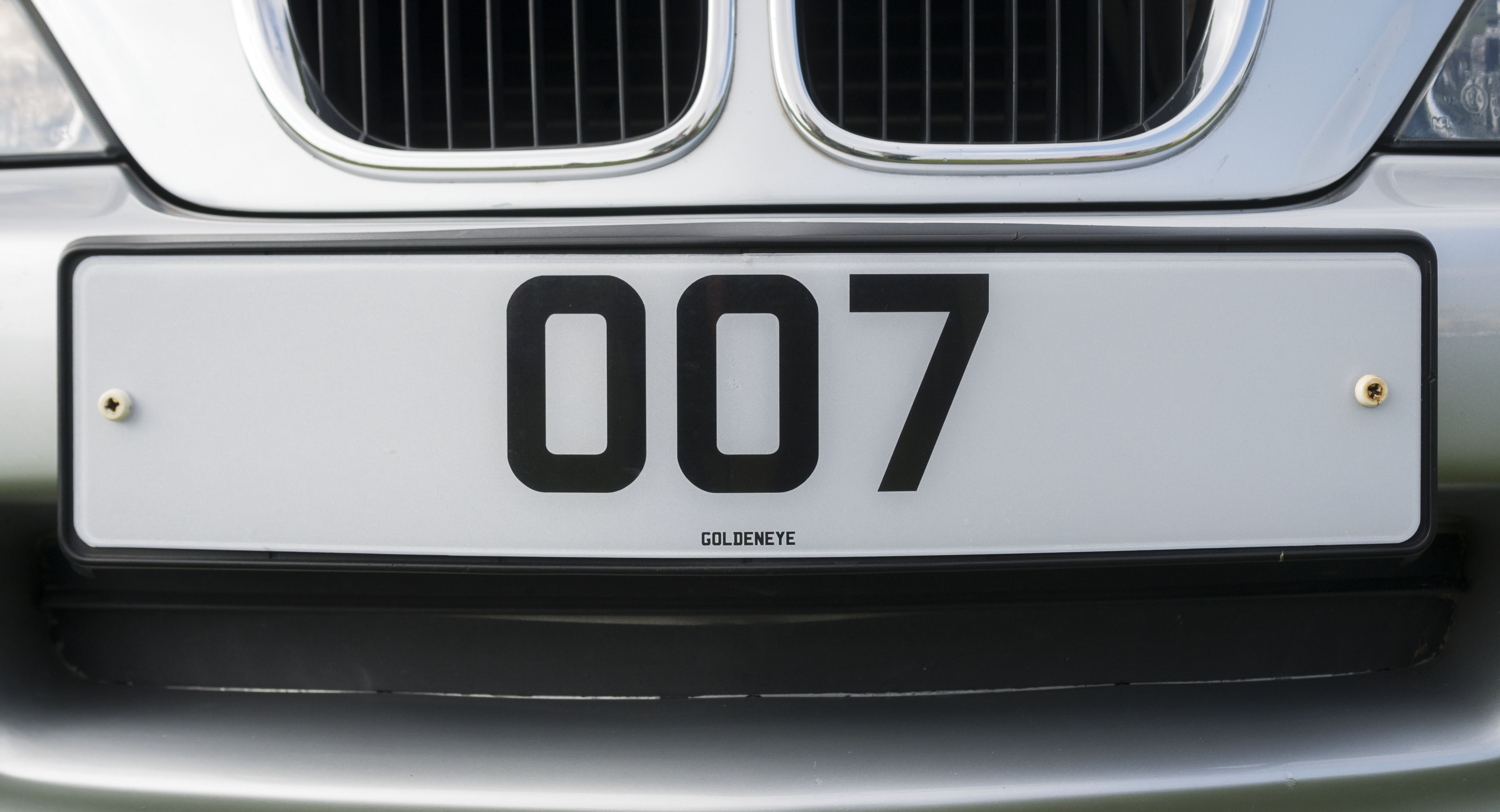 A close up of a personalised number plate showing '007'