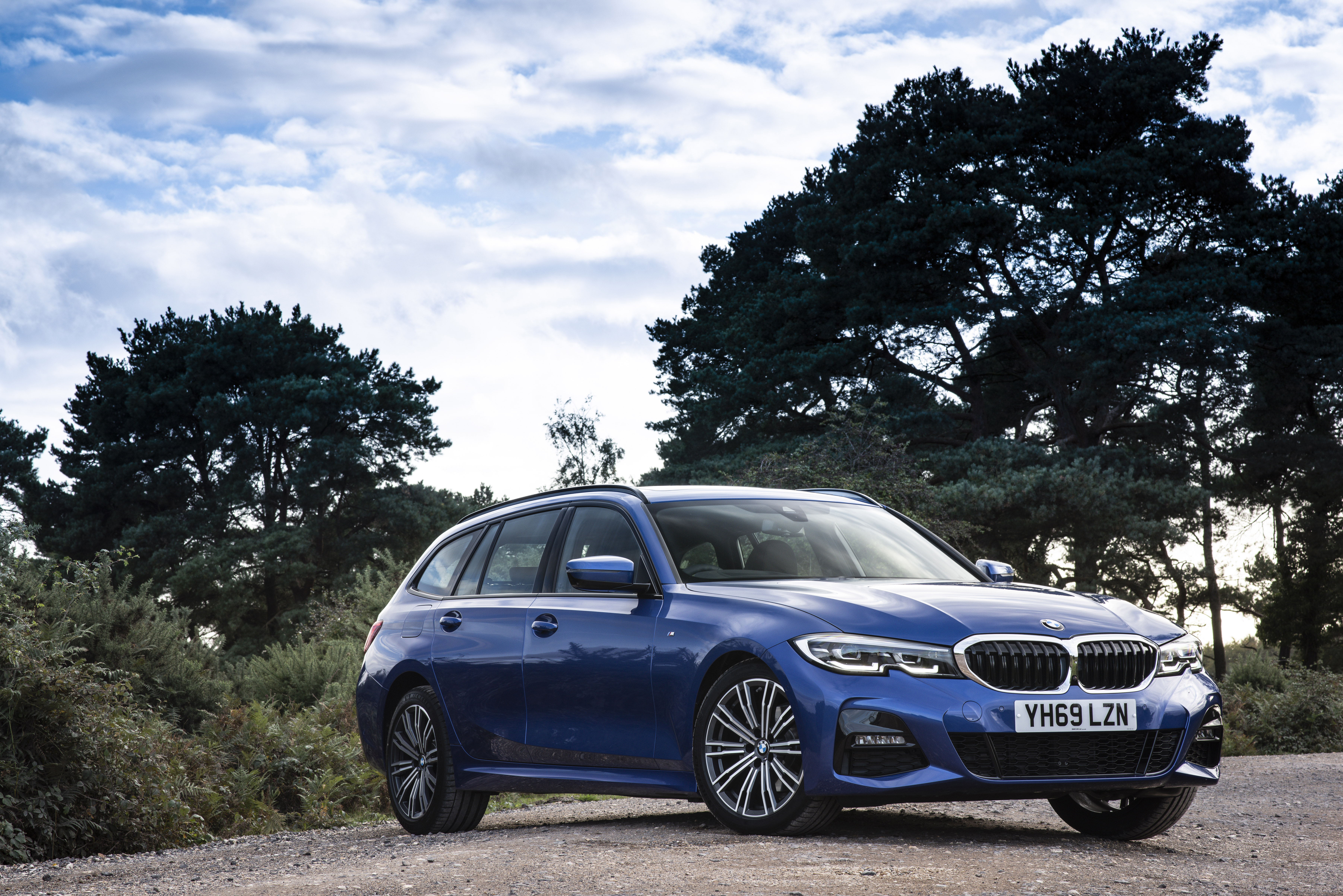 A blue BMW 3 Series Touring