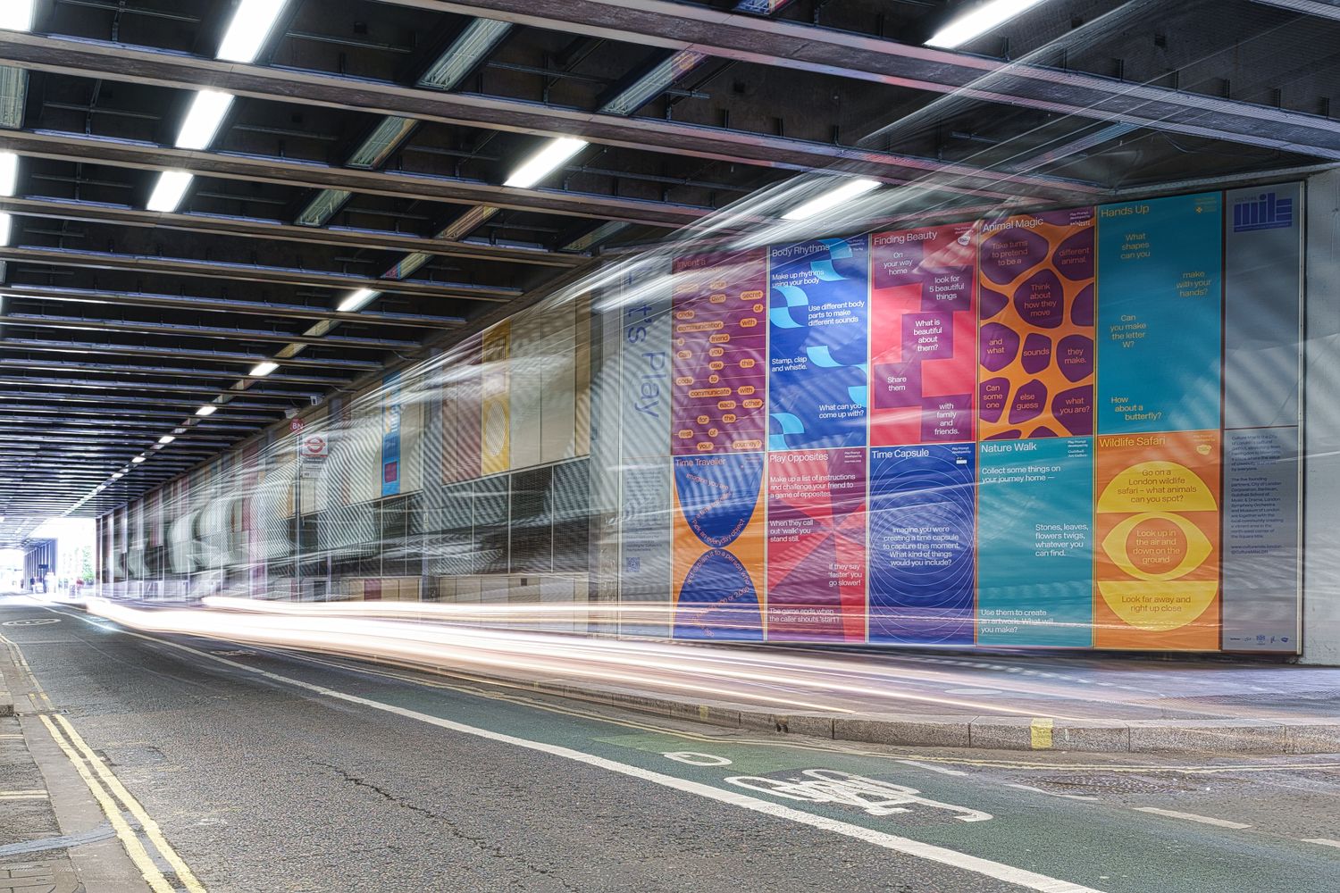 A bike whizzes by this collection of Culture Mile wall graphics, just one of the improvements made to this newly founded creative quarter of London.