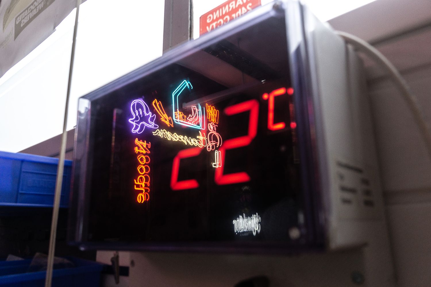 Jaison's neon creation reflecting in the temperature indicator.