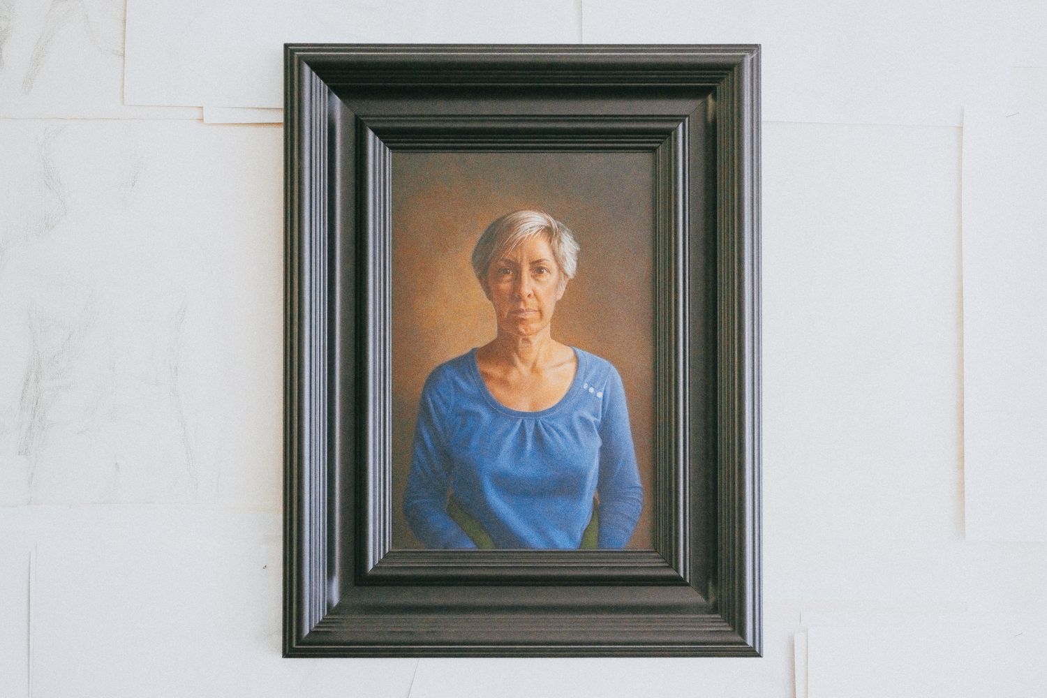 Framed portrait painting by John Burke showing observational realism and tonal colour work