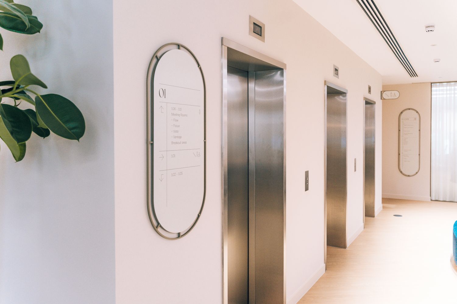 3D office directory signage at Ellisse by Spacemade, integrated into the lift lobby and workplace circulation space.