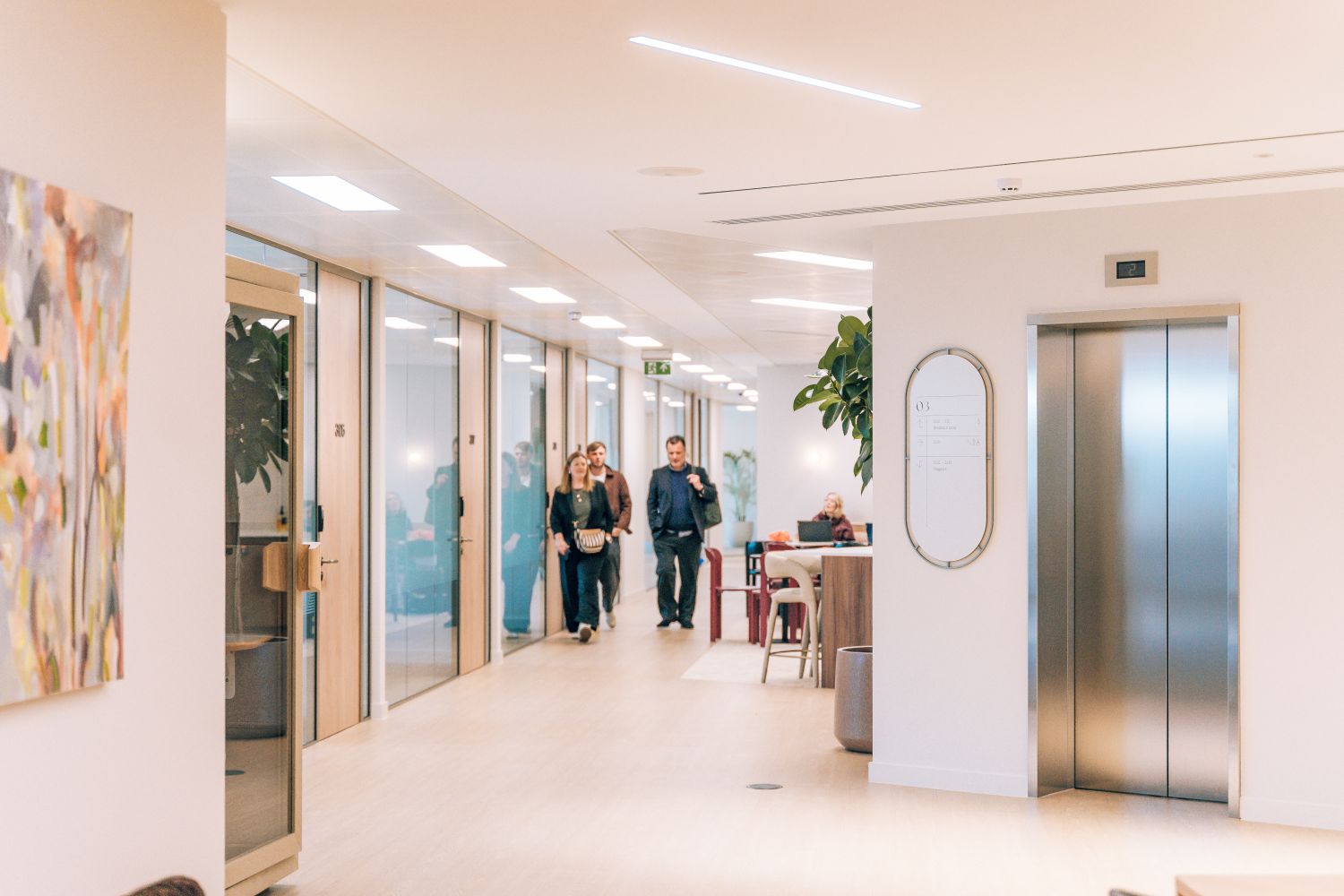 Bespoke workplace directory signage at Ellisse by Spacemade, positioned beside the lift lobby for clear office wayfinding.