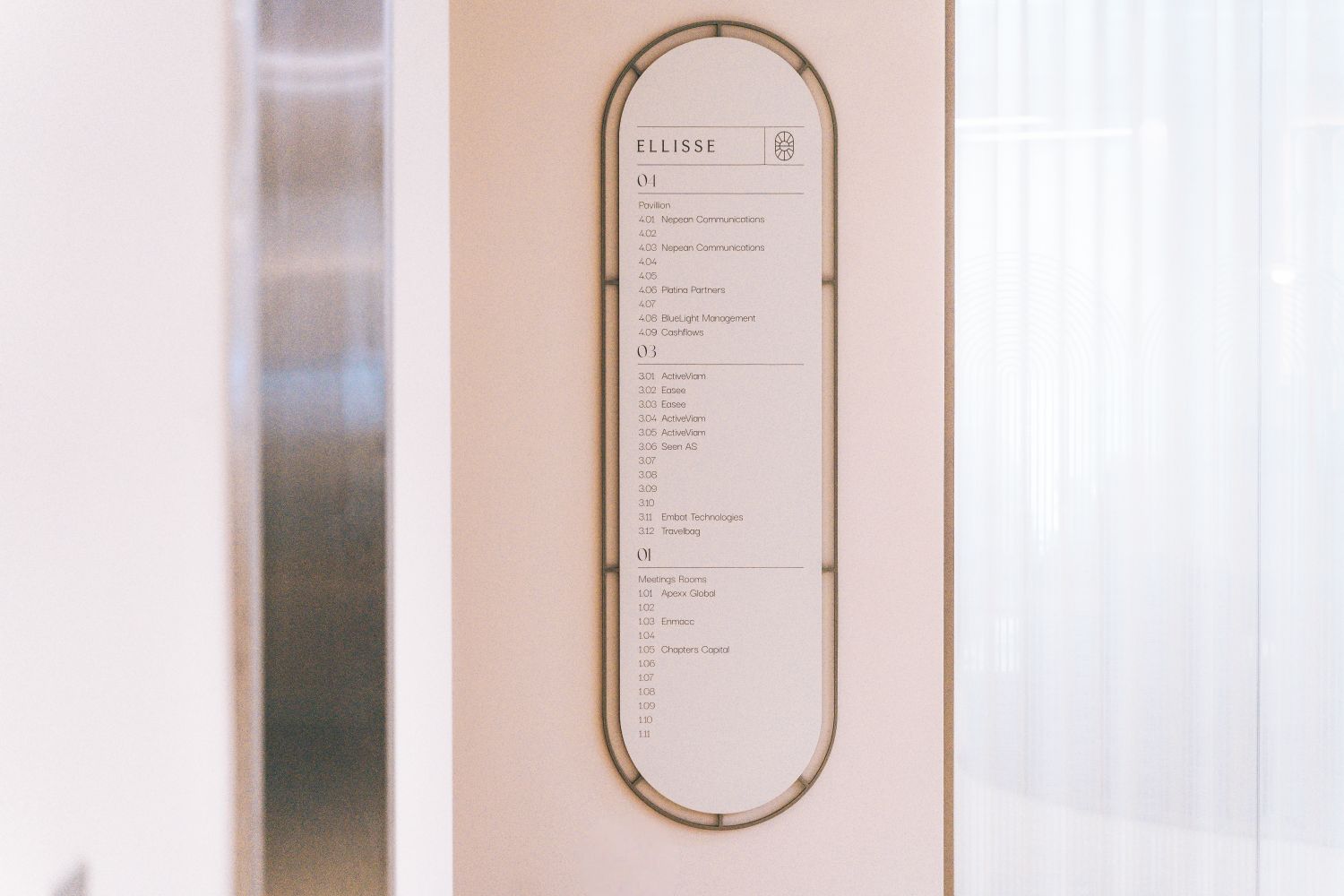 3D office directory at Ellisse by Spacemade, with shaped metal frame and branded workplace wayfinding graphics.