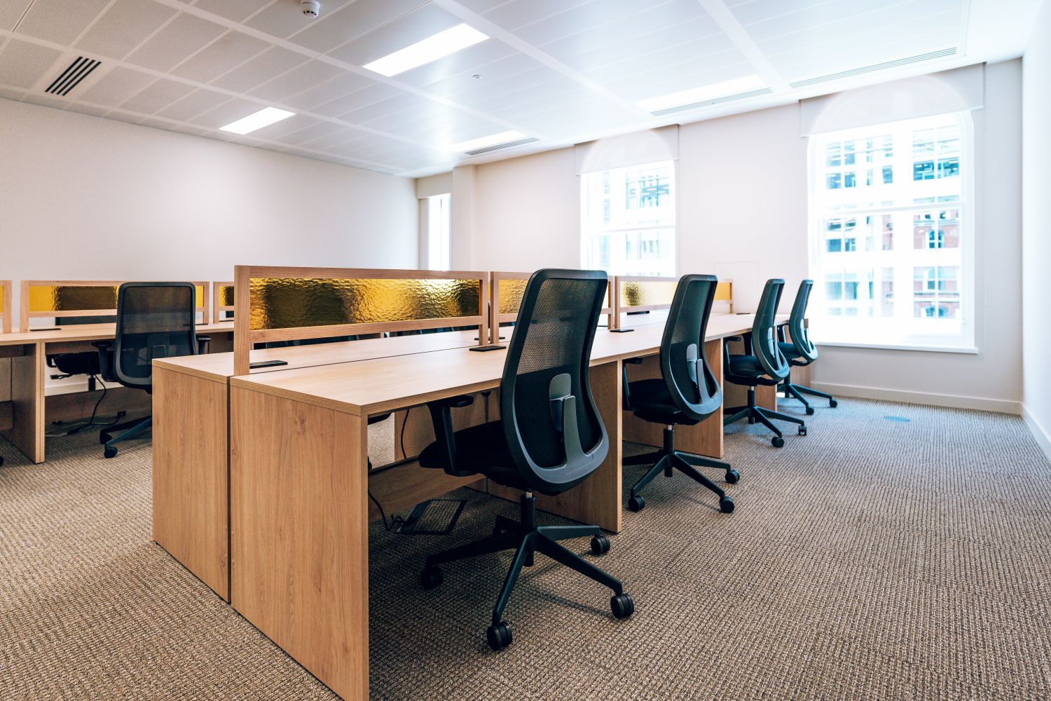 Open plan co-working workspace at Ellisse by Spacemade, part of the premium office interior at 10 St Bride Street.