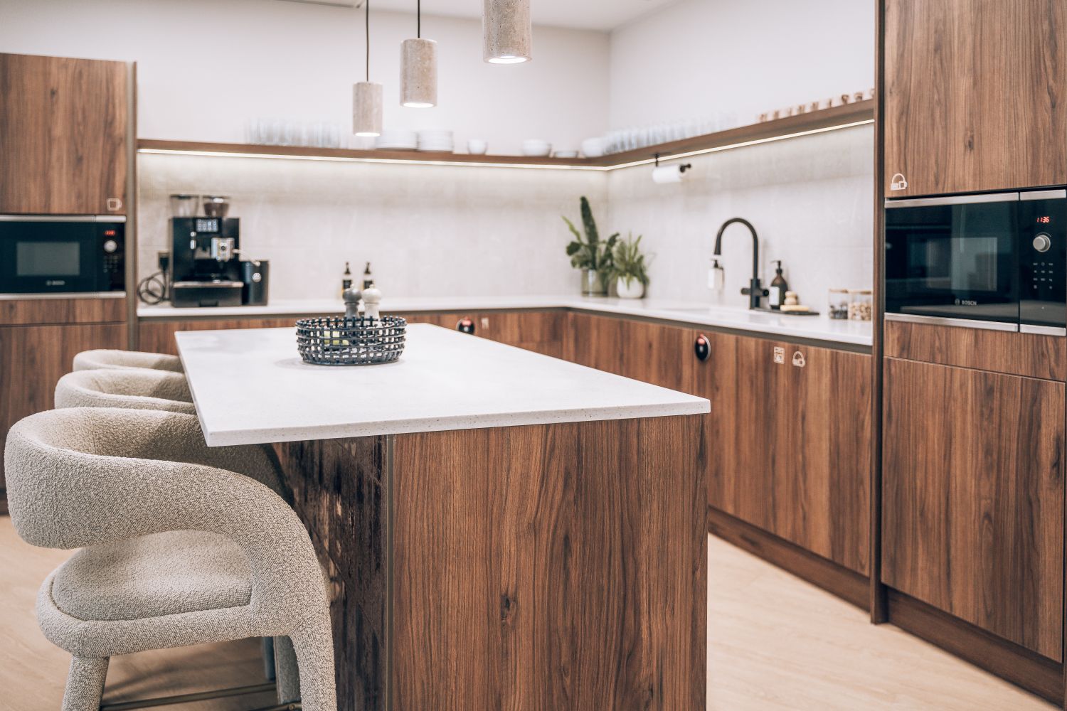 Ellisse coworking kitchen with branded amenity signage integrated into the interior fit out.