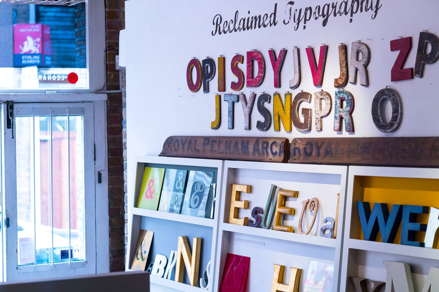 Glyphics studio with a display of vintage letters and Ampersands