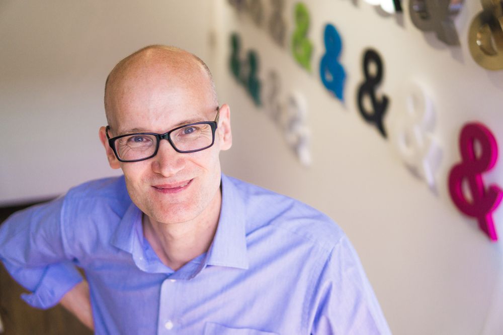 Glyphics managing director photographed in the sign makers' studio