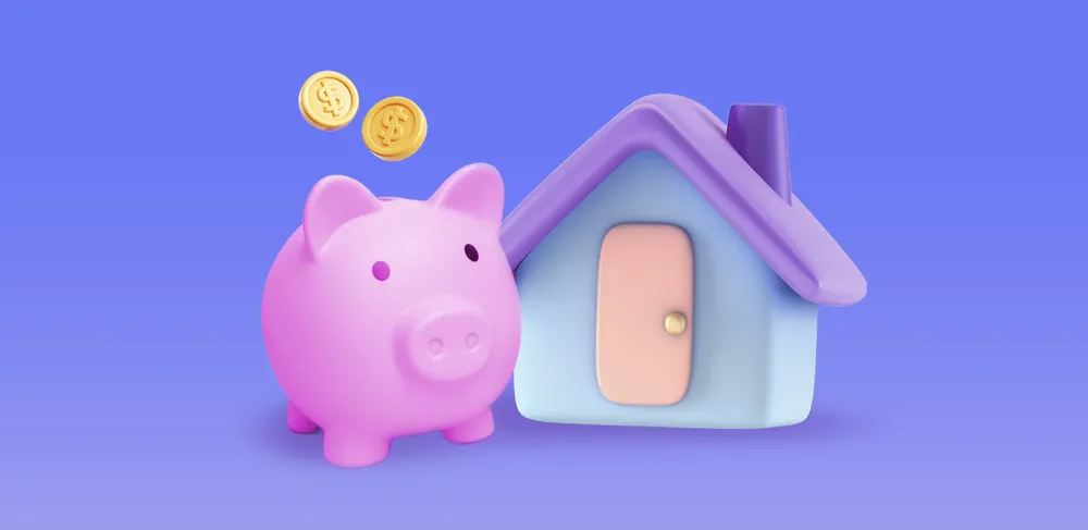 Piggy bank with coins next to a house