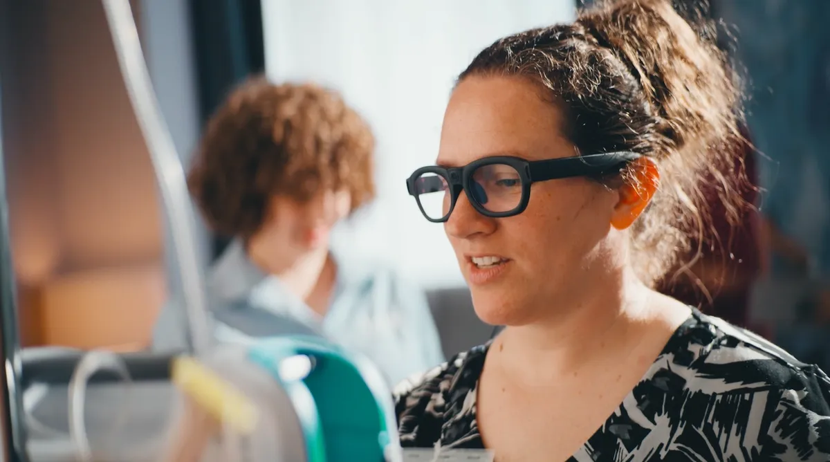 Study participant Kayla Bradshaw, MSN, RN, CCRN-CSC interacts with IV pumps while wearing Tobii Glasses X