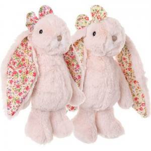 Two plush pink bunny toys with floral-patterned ears and matching bows, standing side by side.
