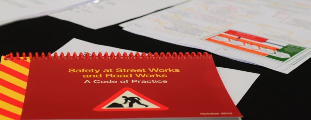 Safety at street works guide book.
