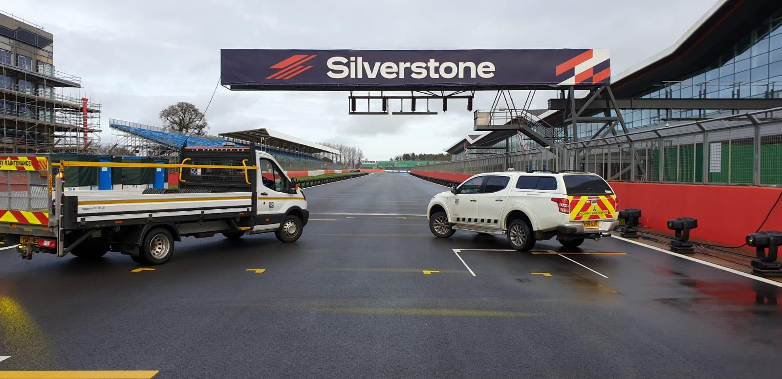 Maintenance vehicles on Silverstone racetrack.