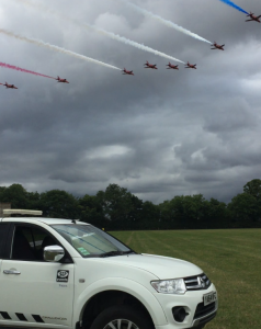 The Red Arrows flying on a cloudy day