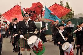 Drummers and pipers lead a procession at the National Eisteddfod festival