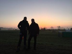 Two people watching the sunset
