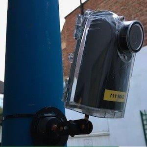 Camera device attached to a pole.