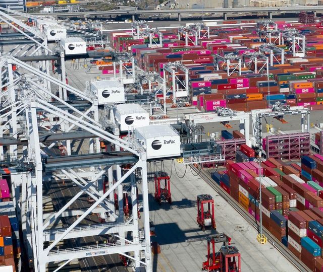 Aerial view of containers and cranes at a port