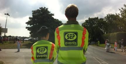 Two SEP marshals wearing high visibility clothing